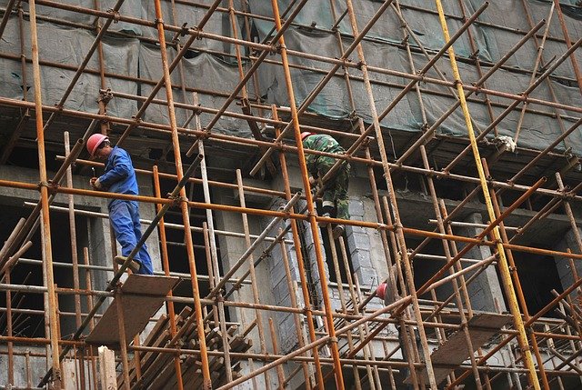 Men amongst scaffolding
