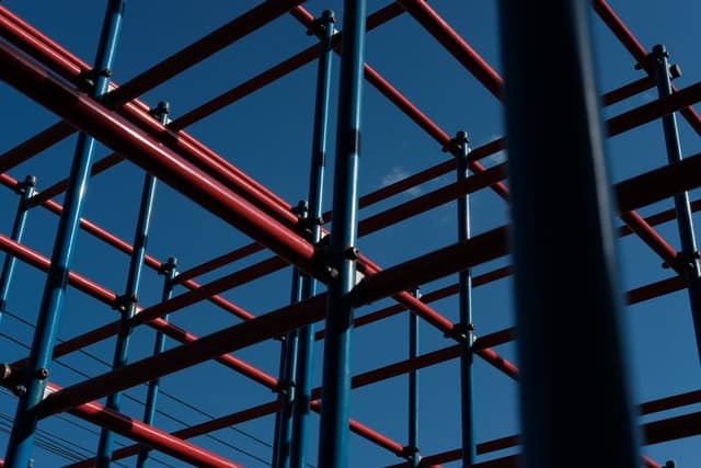 Cross section of scaffolding against blue sky